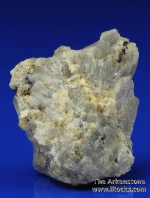 Tochilinite with Dolomite and Uranopyrochlore