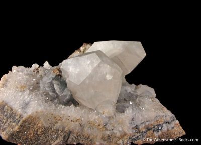 Calcite and Chalcopyrite, on Quartz