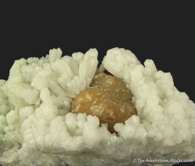 Plumboan Aragonite var. Tarnowitzite (fl) and Calcite (fl)